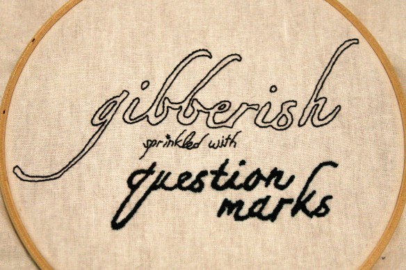 gibberish sprinkled with question marks embroidery